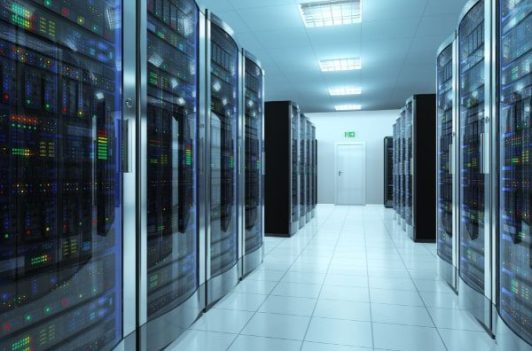 Modern server racks in a bright data center aisle optimized for high-performance and secure data processing.